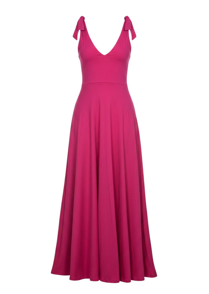cottonandlily pink sleeveless maxi dress with a plunging neckline, adjustable shoulder ties, and side pockets.